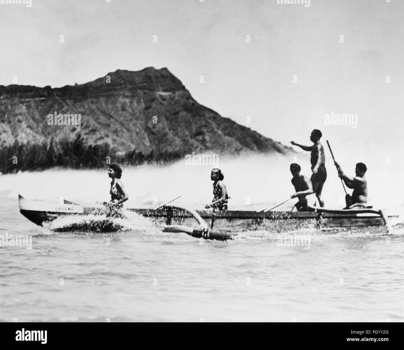 HAWAII OUTRIGGER, 1947. /nMen and women rowing an outrigger canoe of