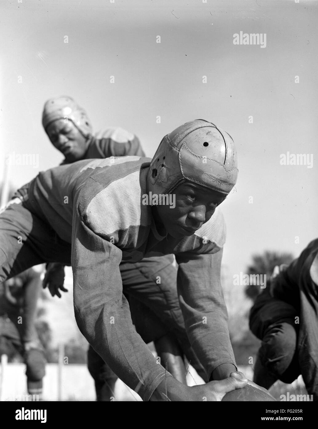 FOOTBALL TEAM, 1943. /nA football player from BethuneCookman College