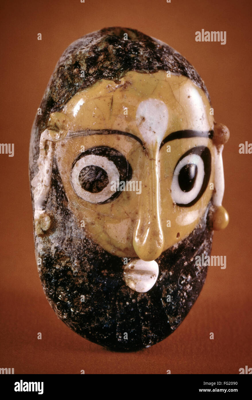 CARTHAGE: PENDANT. /nFunerary pendant in the form of a miniature mask ...
