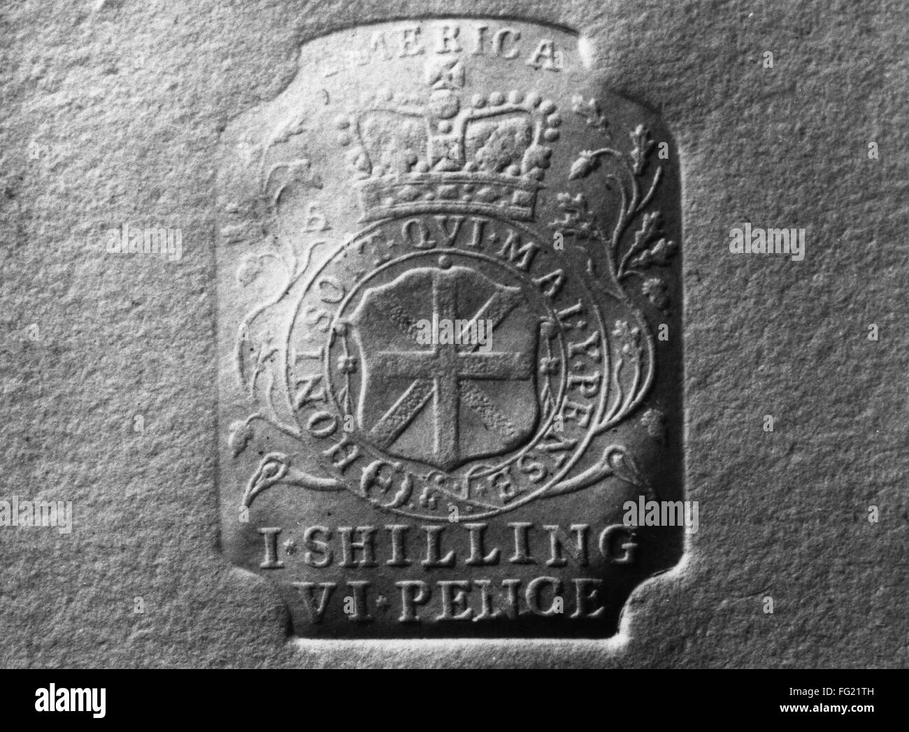 COLONIAL TAX STAMP. /nTax stamp issued by British government for use on papers in the American colonies. Stock Photo