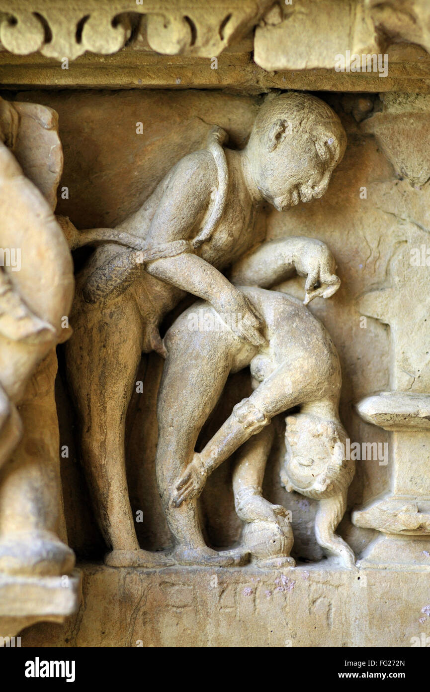 Khajuraho mithuna couples on wall of lakshmana temple madhya pradesh India Stock Photo