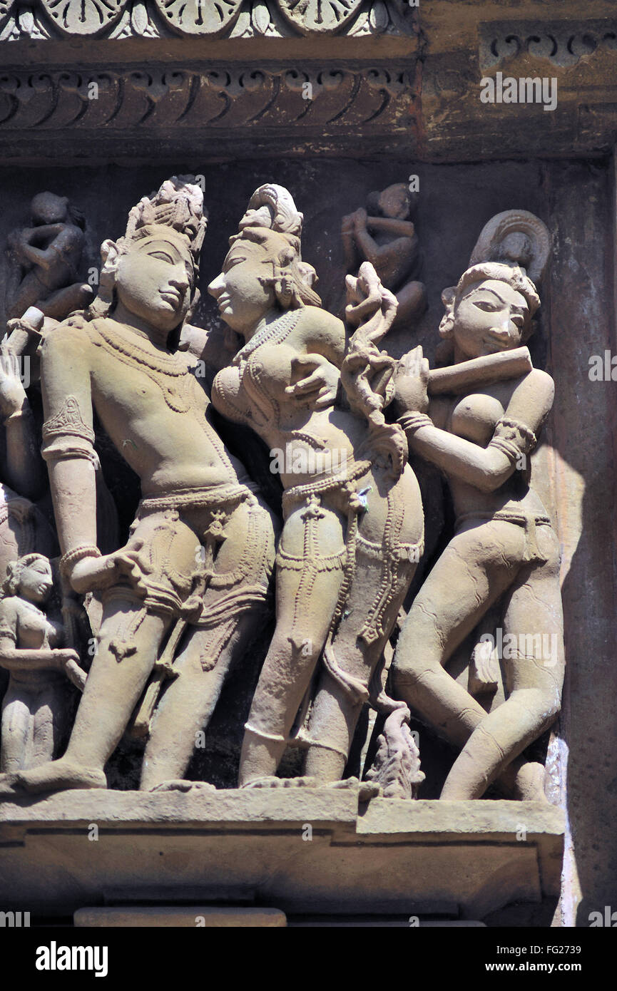 Khajuraho ornate carved sculptures on wall of lakshmana temple madhya