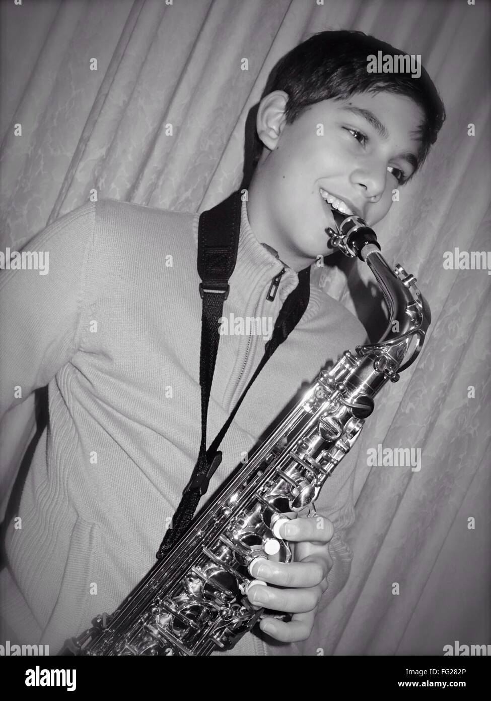 Boy Playing Saxophone High Resolution Stock Photography and Images - Alamy