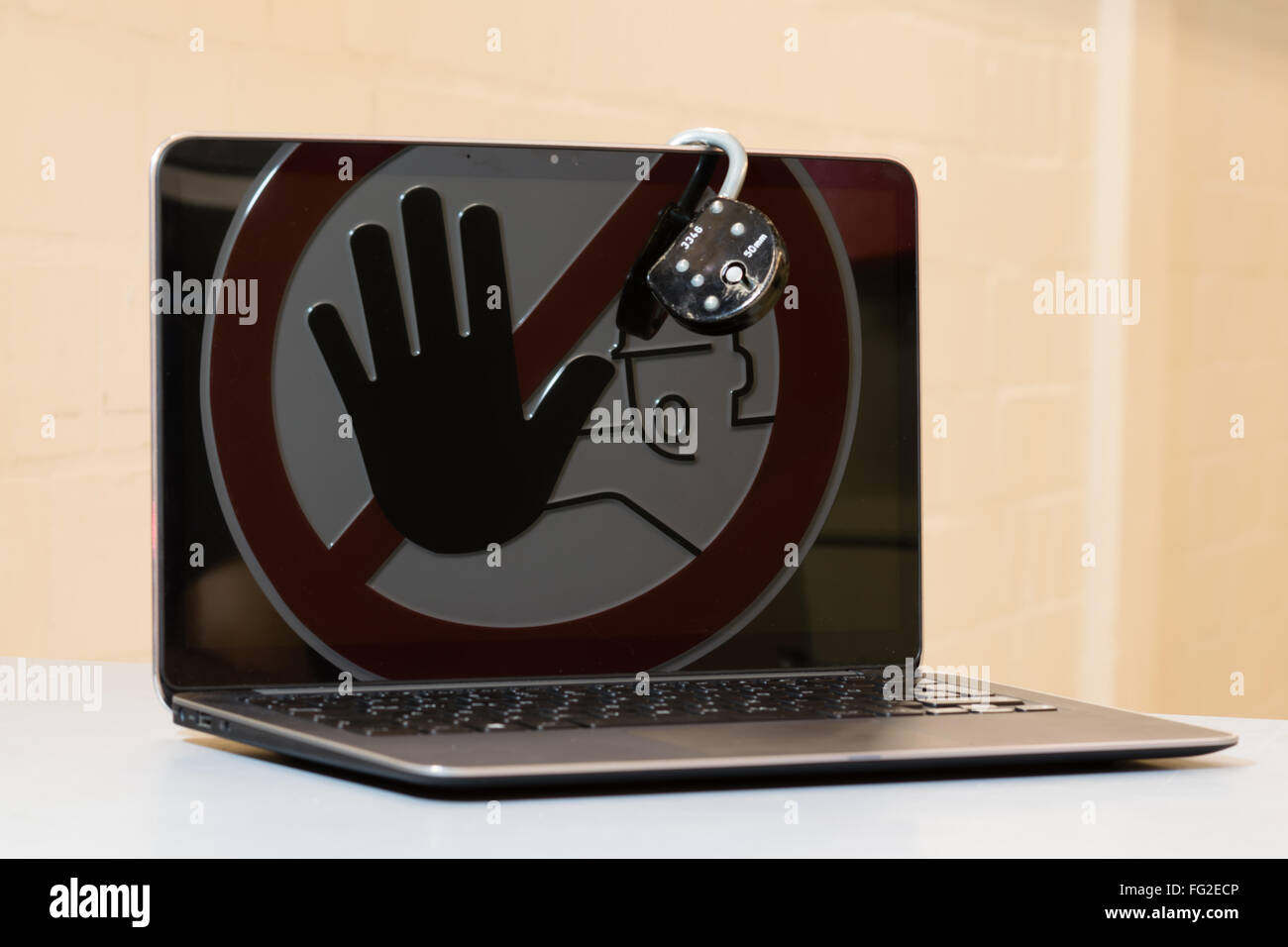 Lock at Notebook. Concept of stopping tinternet crime. Stock Photo