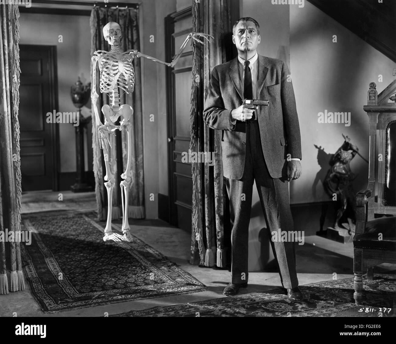 HOUSE ON HAUNTED HILL, 1959. /nAlan Marshal in a scene from 'House on