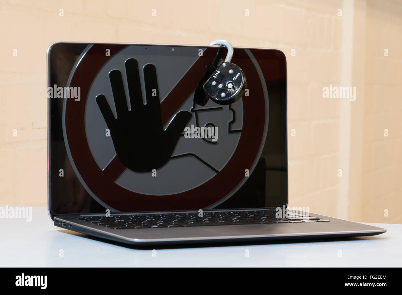 Lock at Notebook. Concept of stopping tinternet crime. Stock Photo