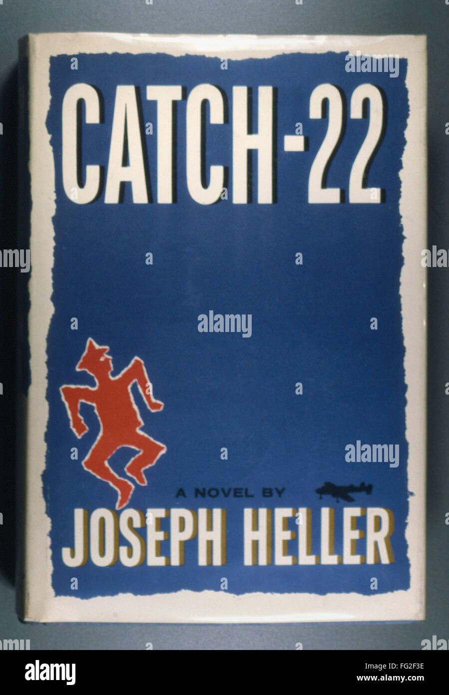 HELLER: CATCH-22, 1961. /nFirst edition of 'Catch-22' by Joseph Heller, 1961. Cover designed by Paul Bacon. Stock Photo