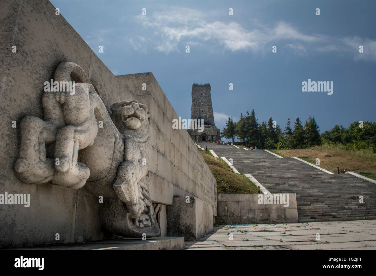 Shipka war memorial high in the Balkan mountains above the Shipka pass in Bulgaria with lion sculpture and steps. Stock Photo