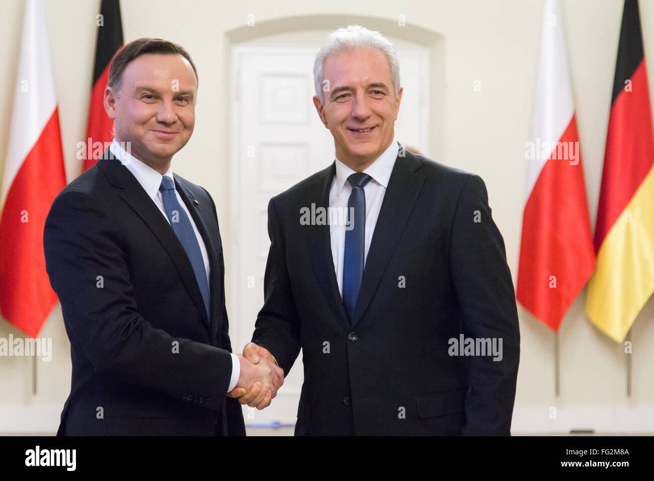 Polish President Andrzej Duda (L) welcomes President of the German Bundesrat Stanislaw Tillich (R) in Presidential Palace on 17 February 2016 in Warsaw, Poland. Stock Photo