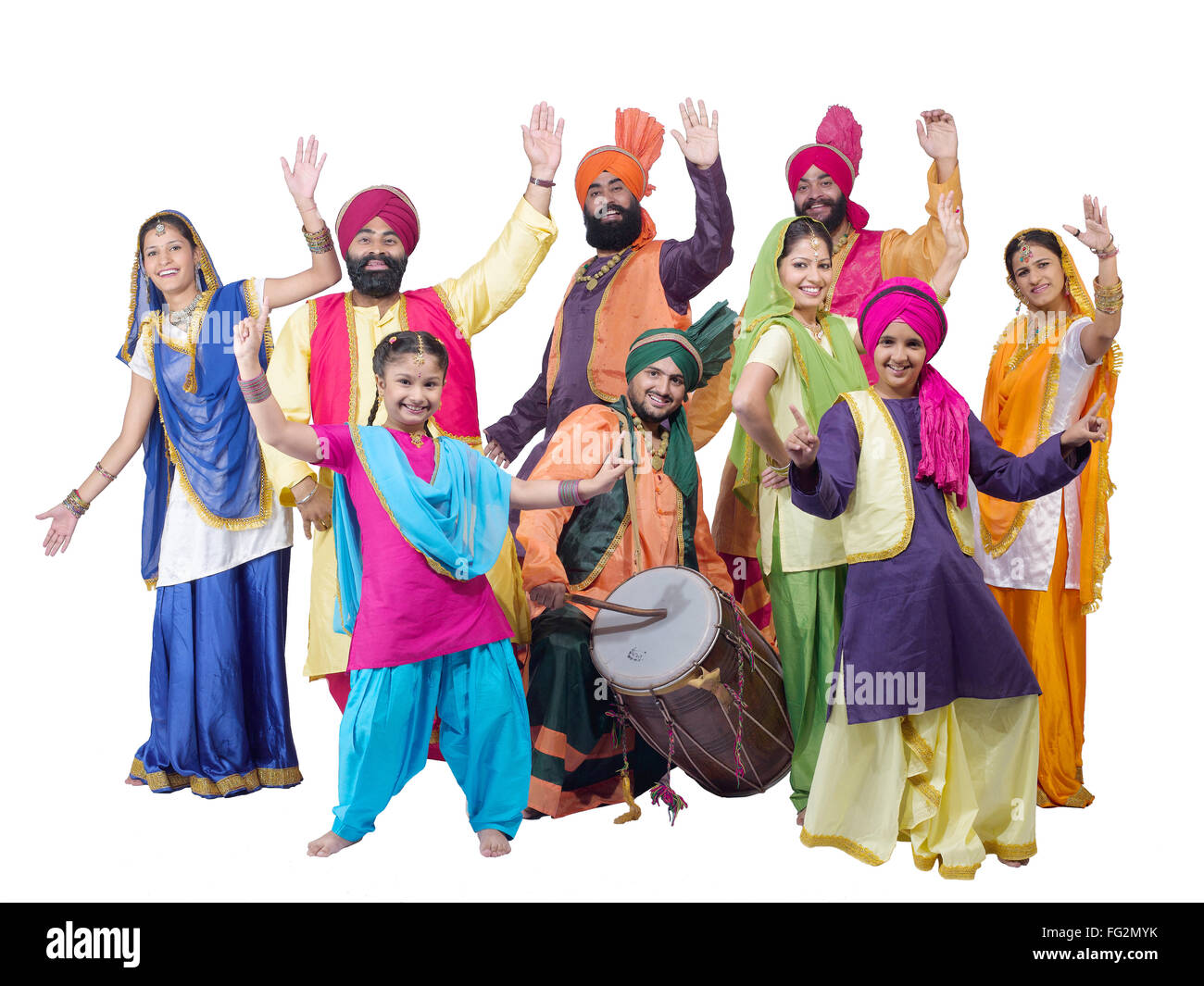 Dancers with sikh family performing folk dance bhangra MR#702X;702Y;702Z;779A;779D;779C;779B;779E;779F Stock Photo