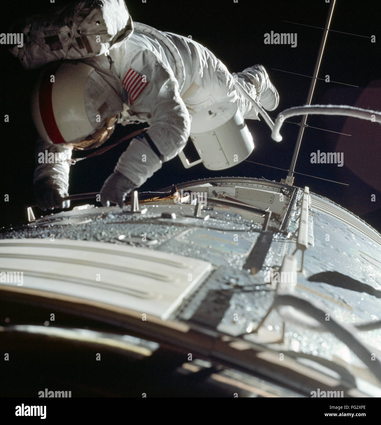 APOLLO 17: SPACEWALK, 1972. /nAstronaut Ronald E. Evans retrieving film ...
