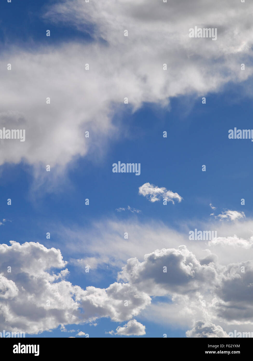 White cloud formation against blue skies Stock Photo
