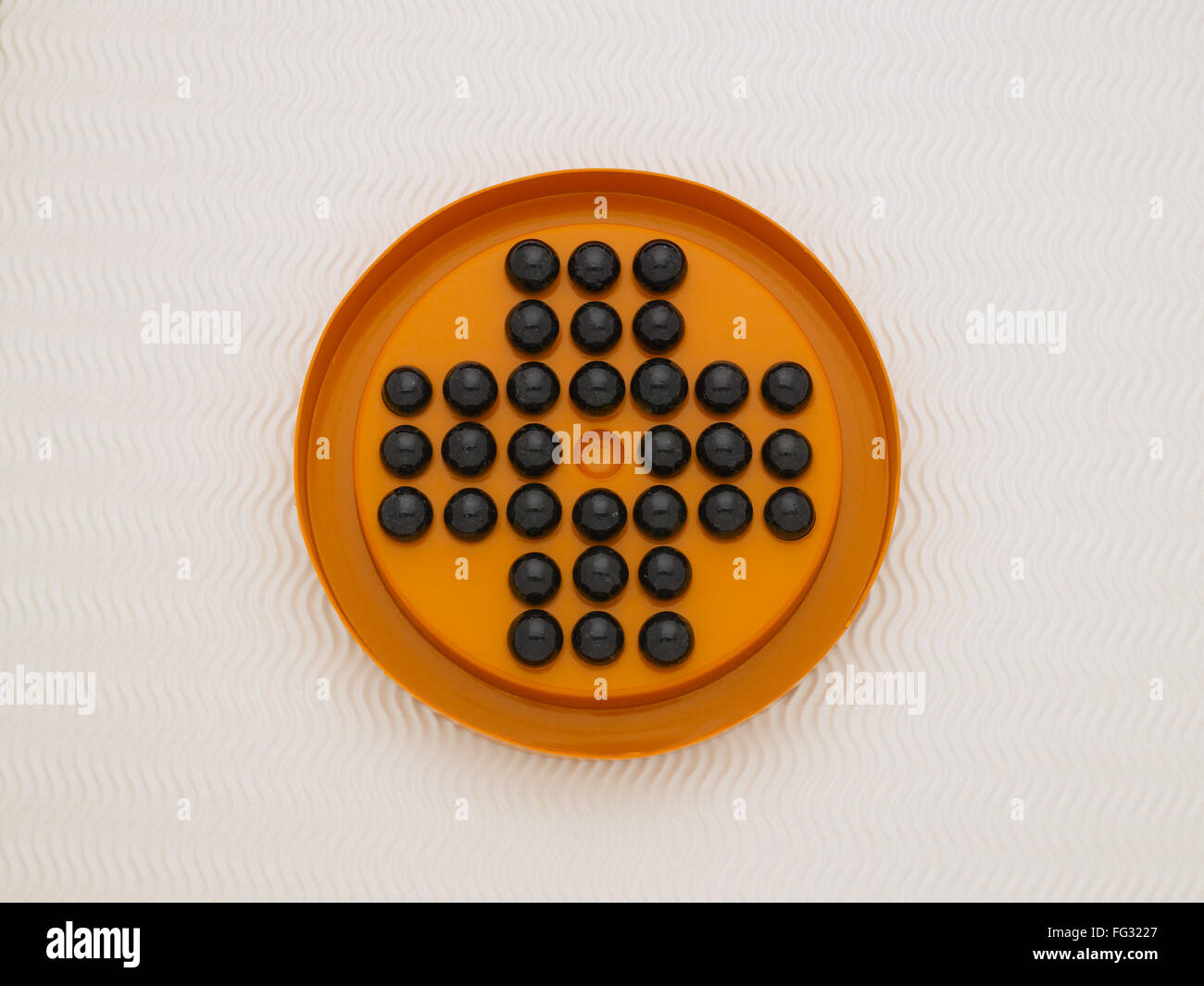 marble solitaire game India Stock Photo Alamy