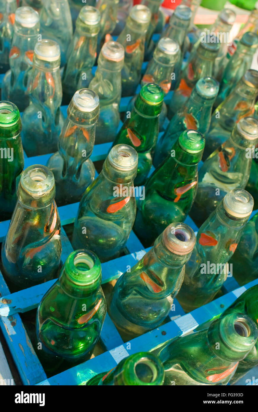 Empty glass soda bottles at Roadside cold drink stall at Dakor temple