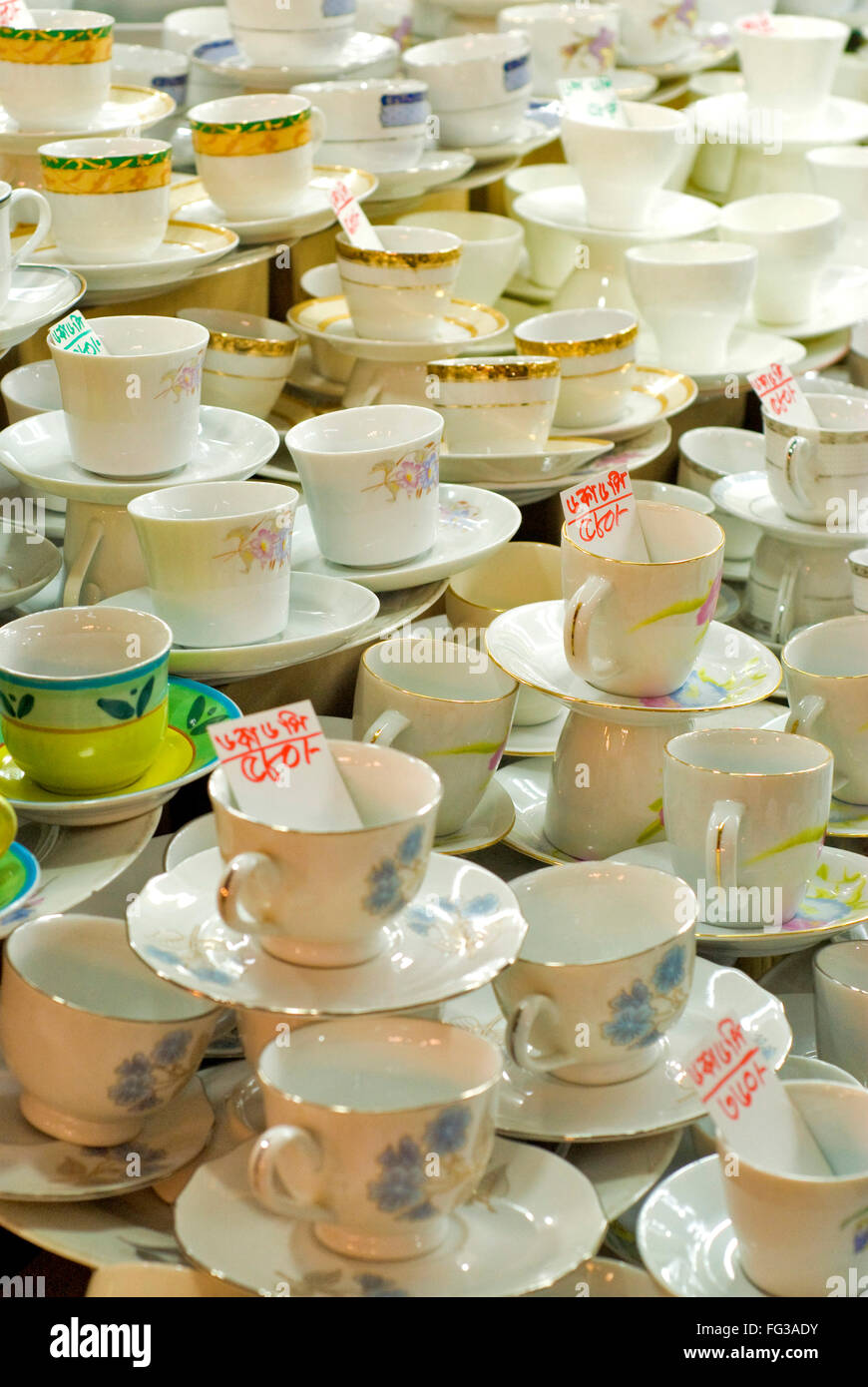 Empty tea cups and saucers for sale in New Market ; Dhaka ; Bangladesh