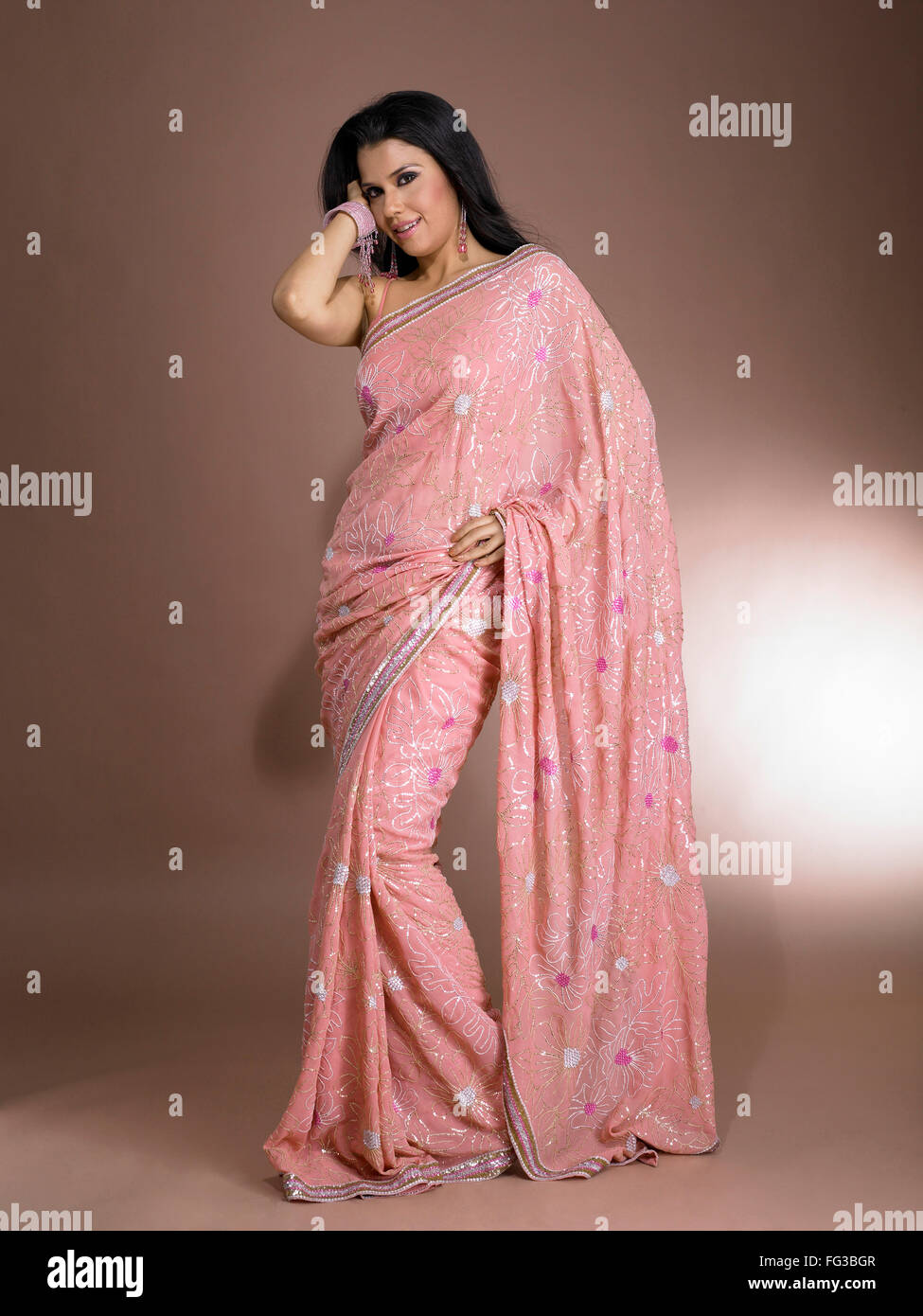 South Asian Indian woman smiling and standing in stylish pose MR # 702 ...