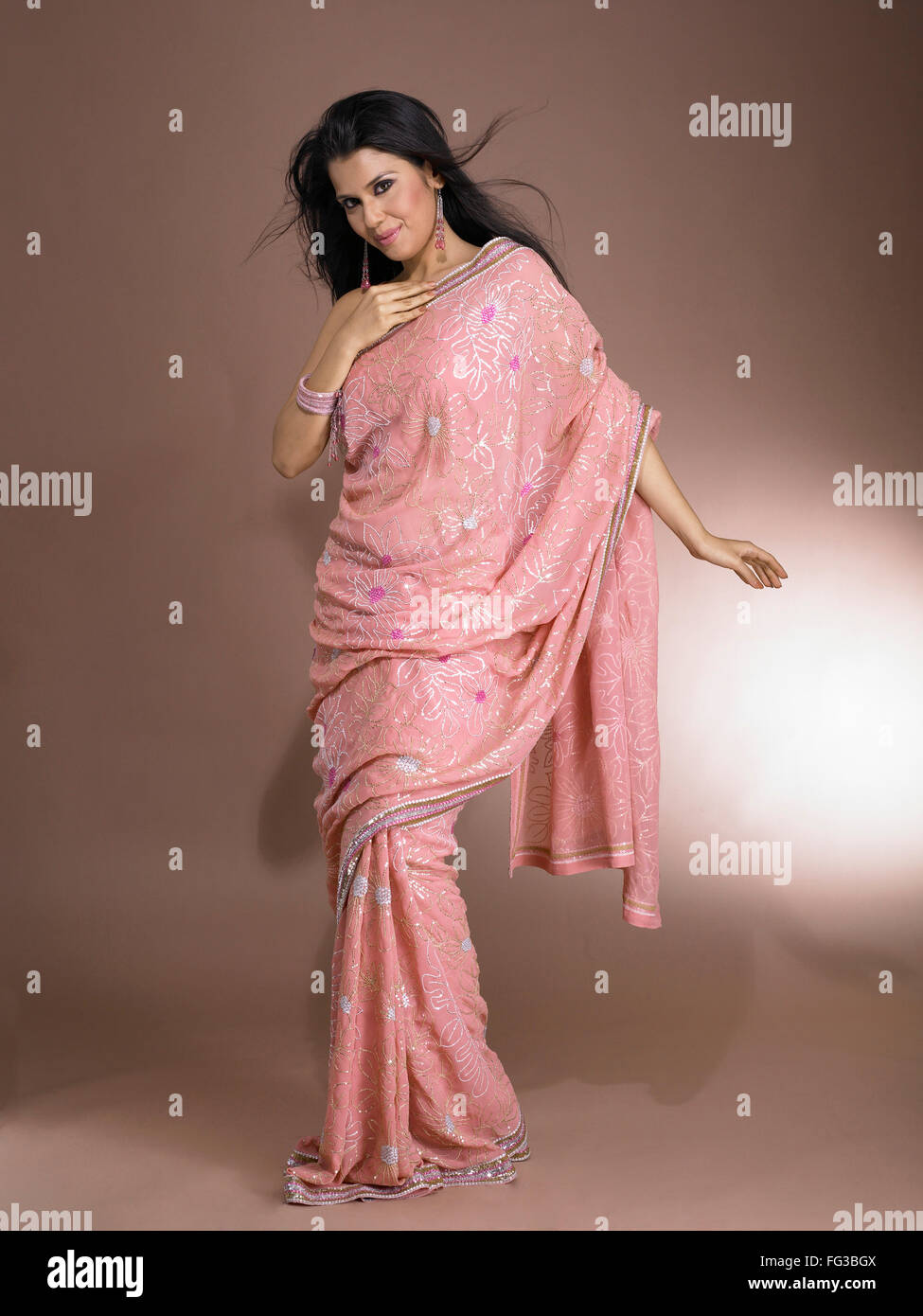 South Asian Indian woman smiling and standing in stylish pose MR # 702 ...