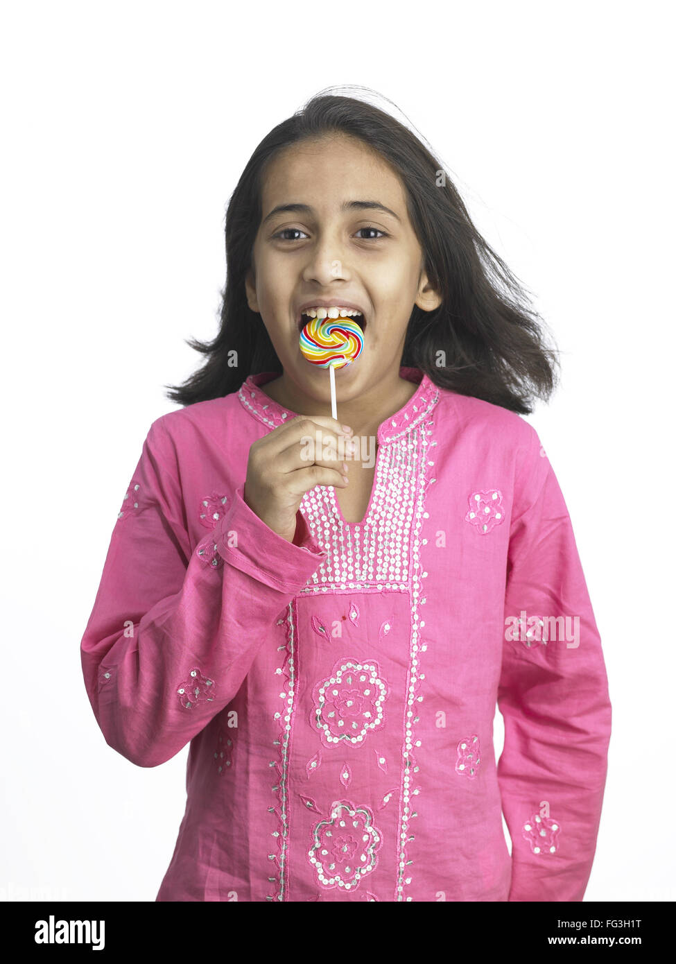 South Asian Indian Girl Sucking Lollipop In Nursery School Mr Stock 