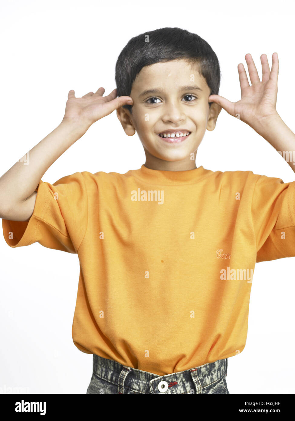 Indian boy making funny face hi-res stock photography and images - Alamy