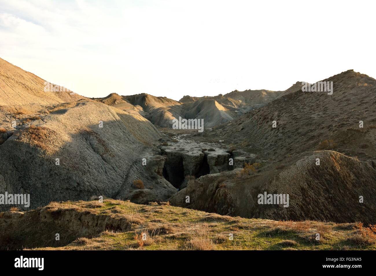 Channel eroded in mud in hills in Azerbaijan. Lokbatan is a small town 15km south west of Baku, with a mud volcano Stock Photo