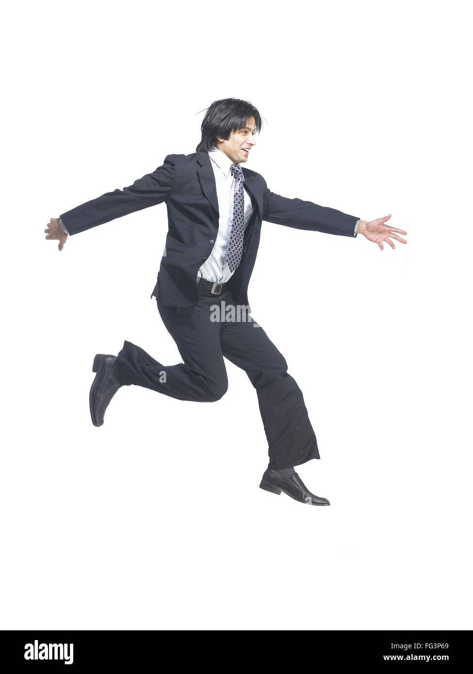 Executive man jumping with joy success winner excitement achievement , Model Released Stock Photo