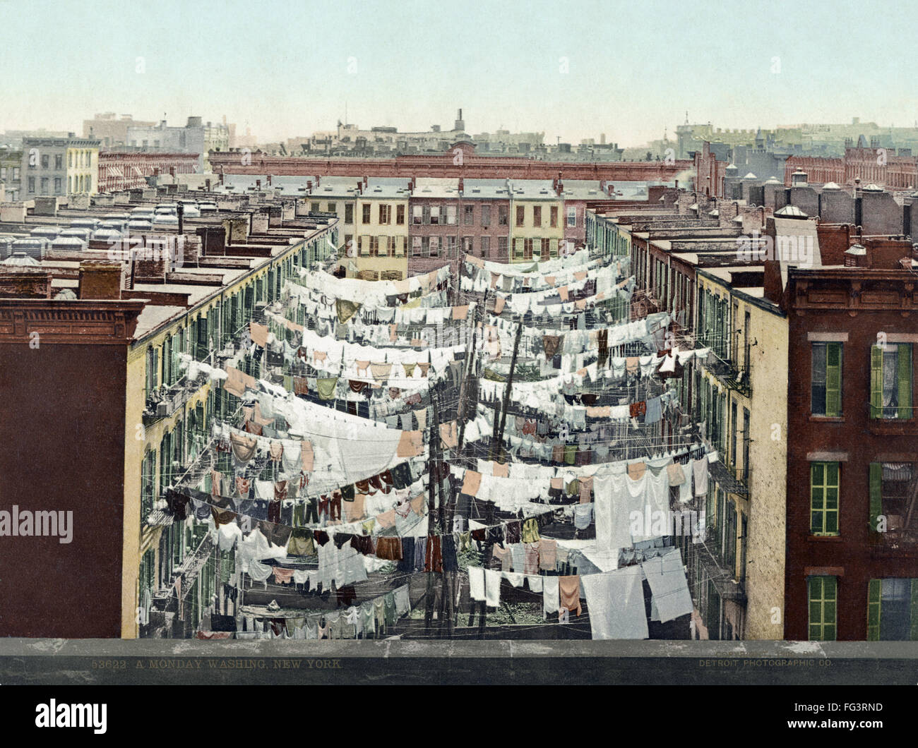 NEW YORK CITY CLOTHESLINE. /nClotheslines hanging between apartment
