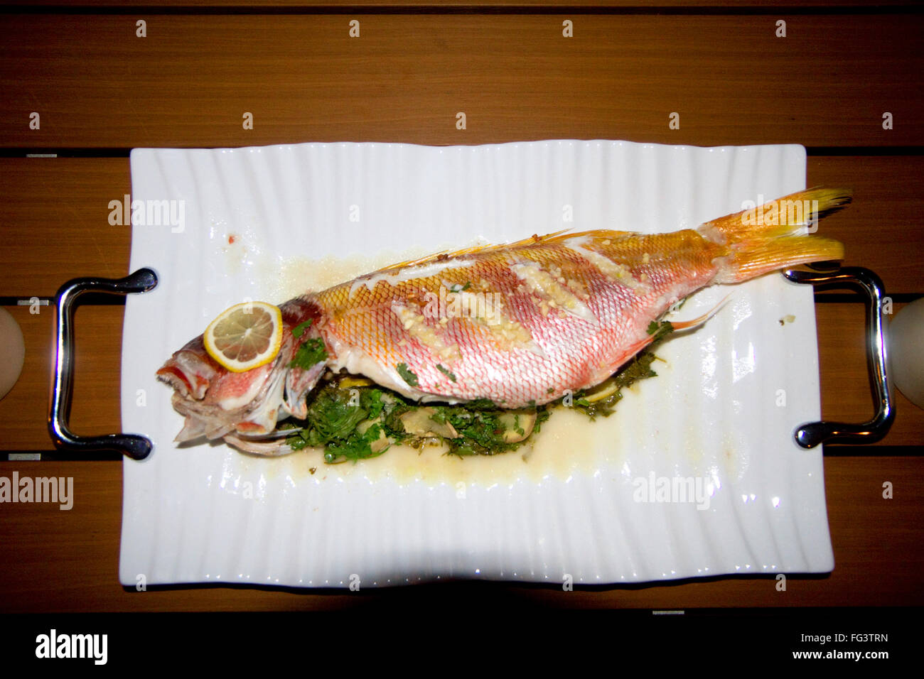 Whole cooked fish at a restaurant in Kona, Hawaii, USA. Stock Photo