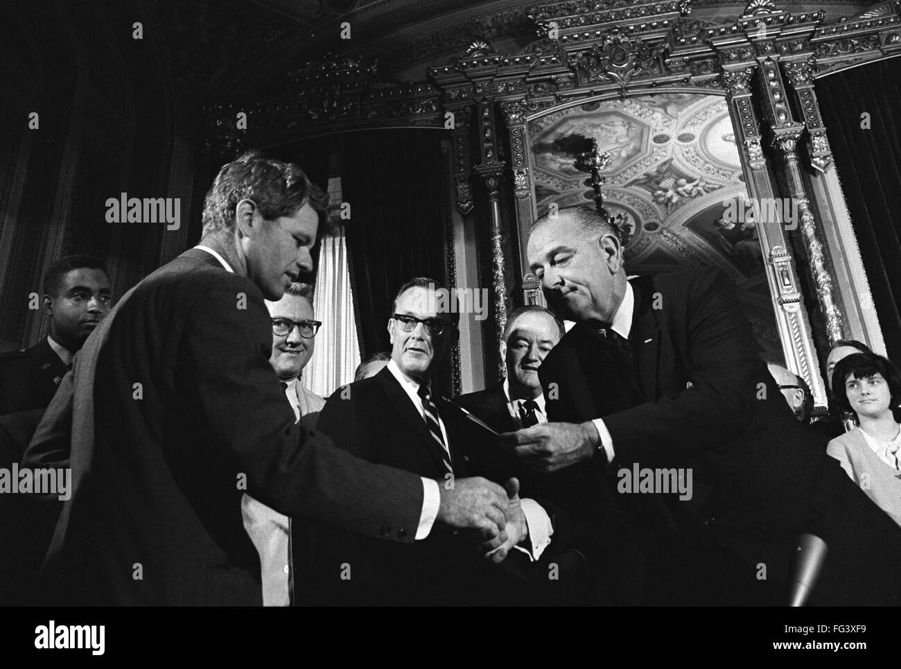 VOTING RIGHTS ACT, 1965. /nPresident Lyndon B. Johnson handing Senator