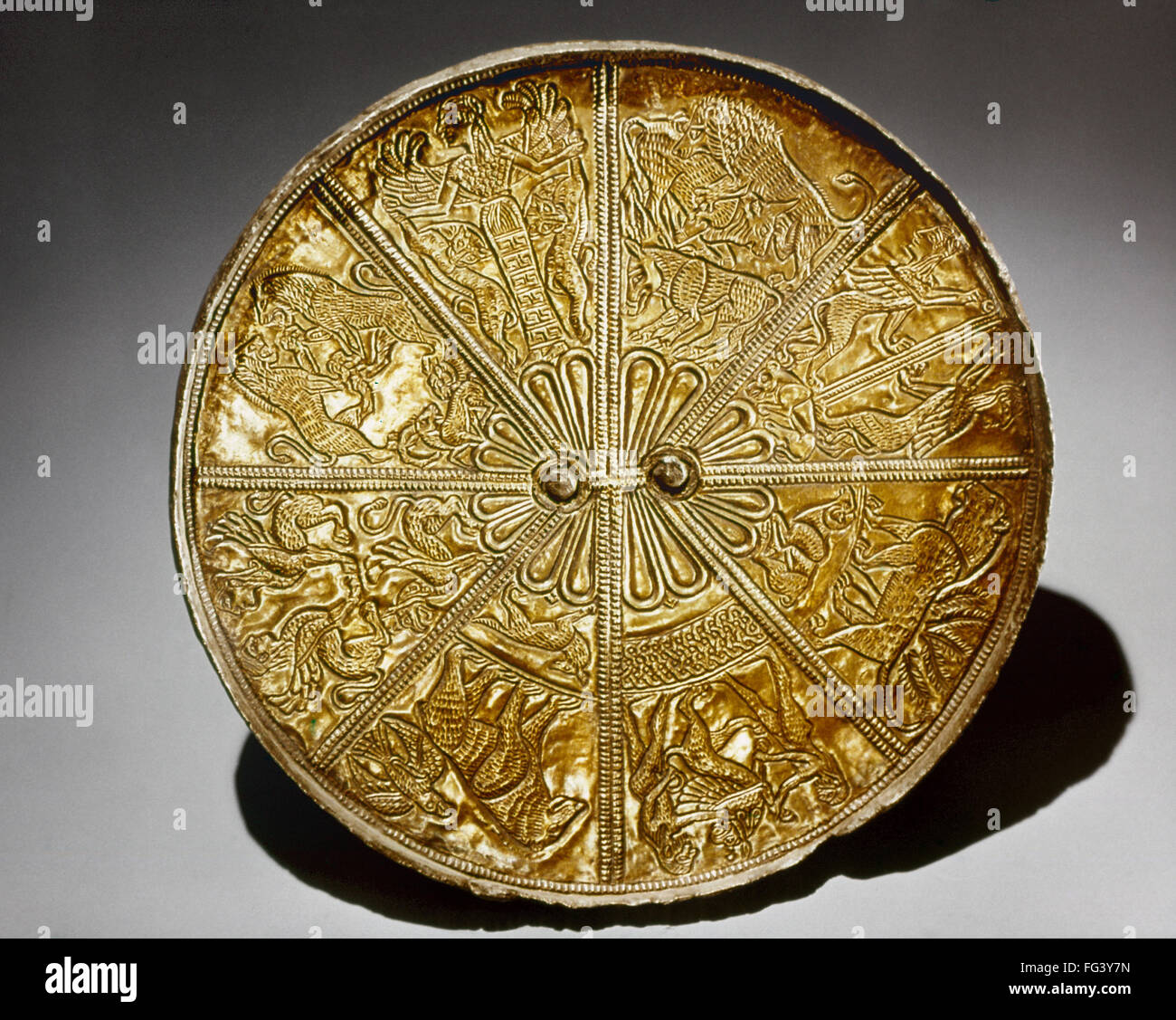 SCYTHIAN MIRROR. /nScythian gilded silver mirror, 1st millenium B.C. Stock Photo