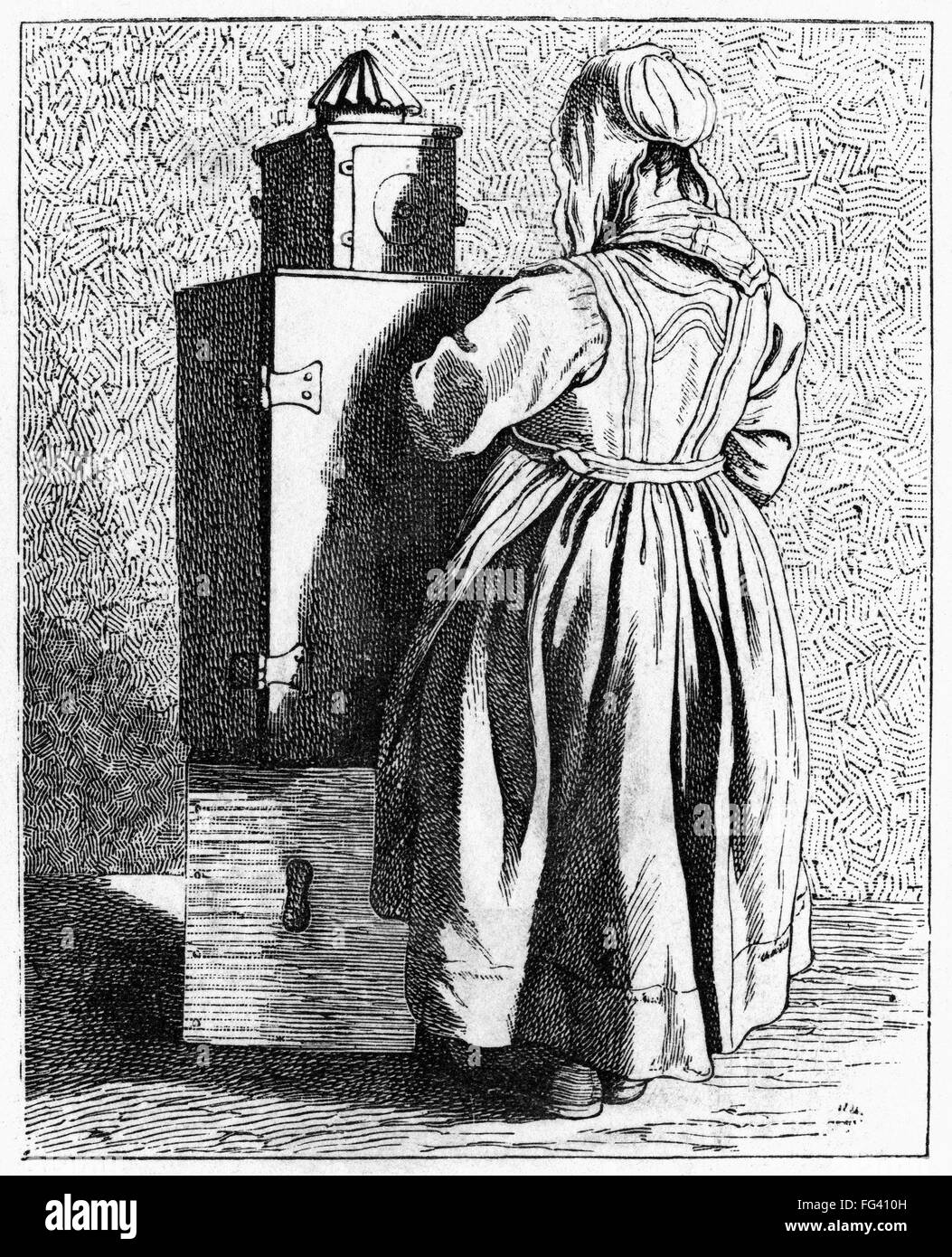 PARIS: MAGIC LANTERN, c1740. /nA woman projecting a magic lantern show on the streets of Paris, France. Engraving, 1875, after an etching by EdmΘ Bouchardon, c1740. Stock Photo