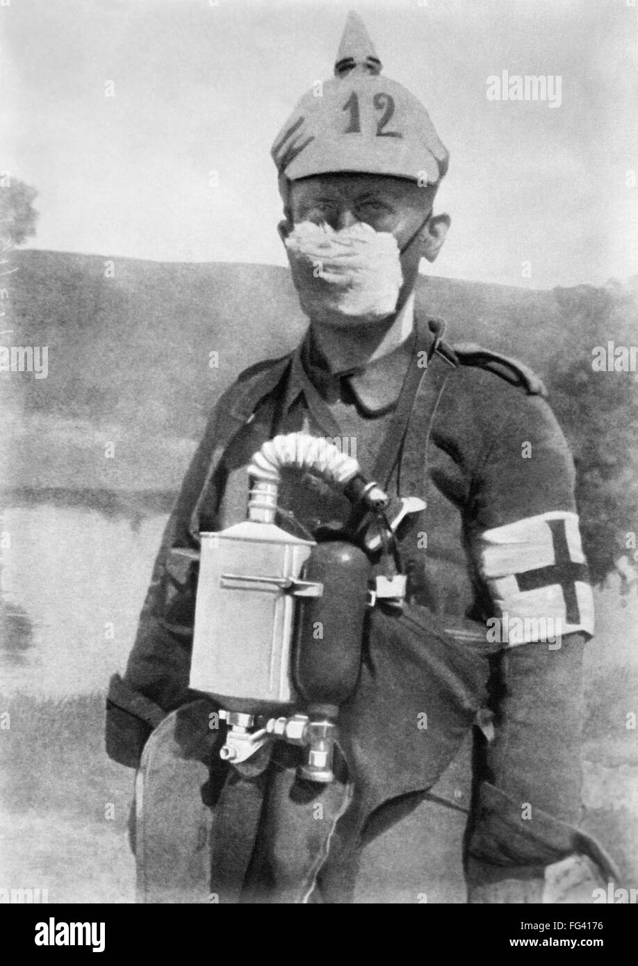 WWI GERMAN SOLDIER, c1914. /nA German medic wearing a face mask to