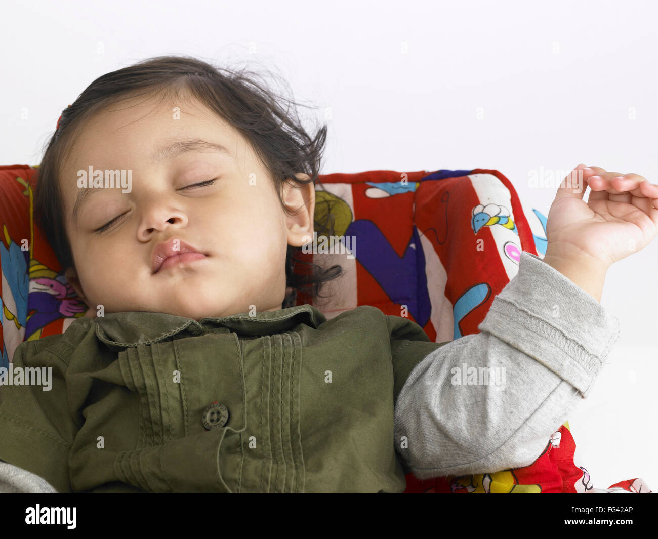 Indian baby girl resting in hi-res stock photography and images - Alamy
