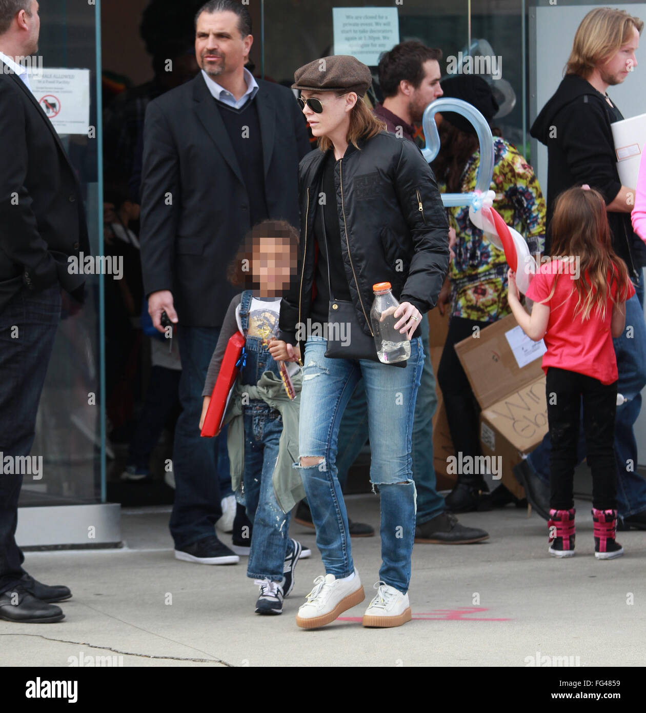 Ellen Pompeo holds her daughter Stella's hand as they leave a birthday