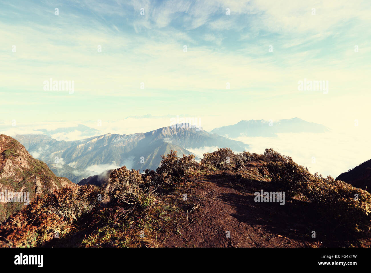beautiful rolling clouds and mountain landscape Stock Photo - Alamy