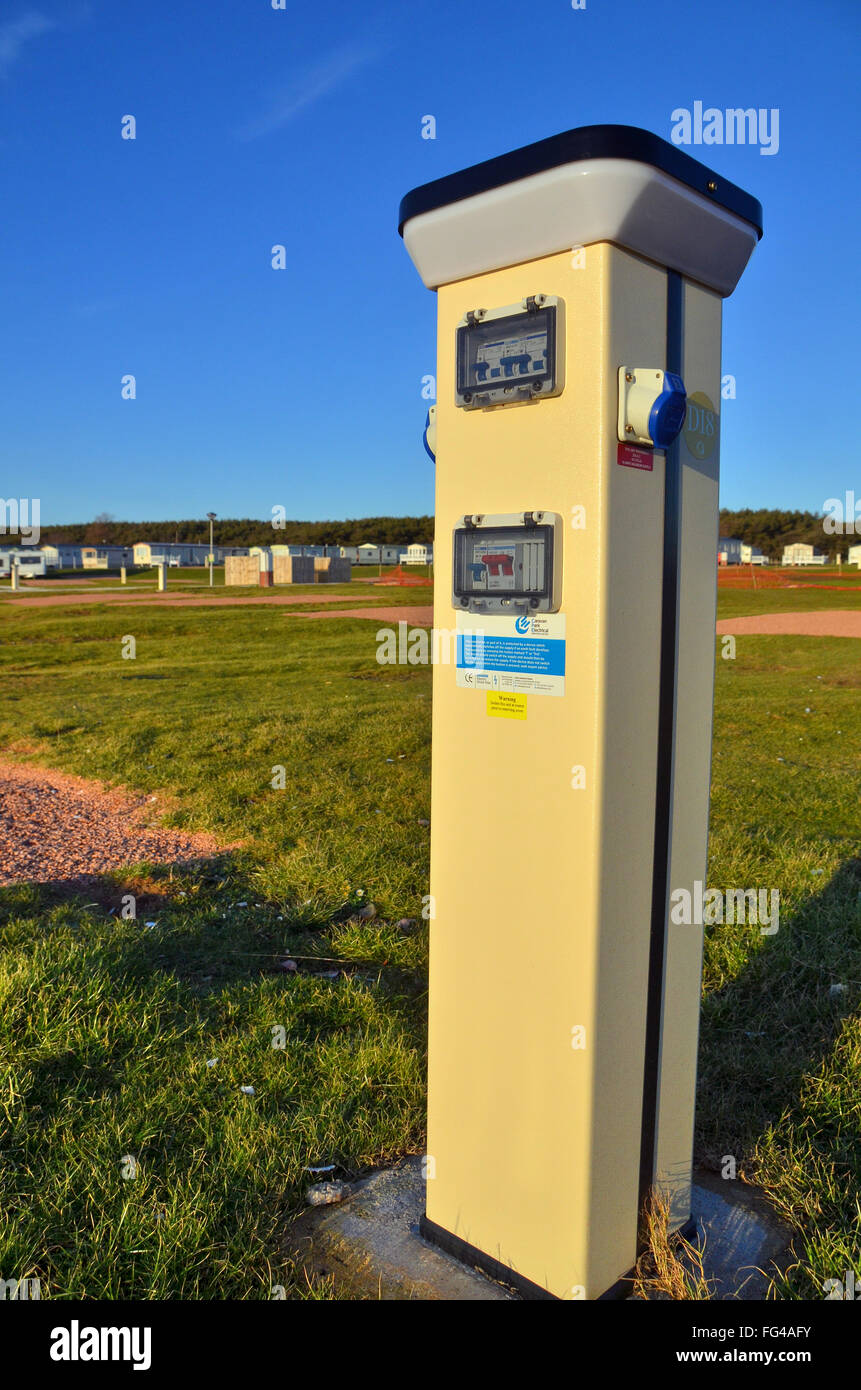 caravan site bay with site socket elctricity outlet for electrical hook ups. Stock Photo