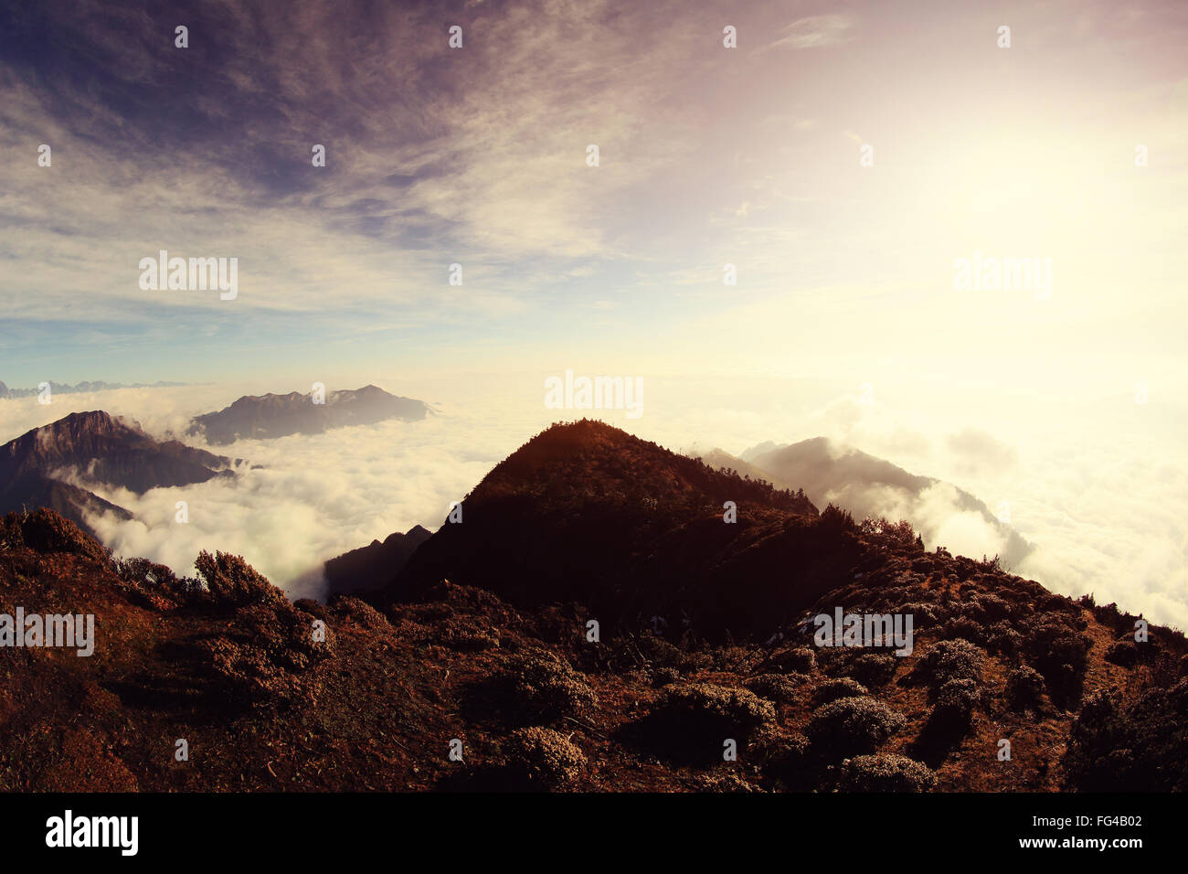 beautiful rolling clouds and mountain landscape Stock Photo - Alamy