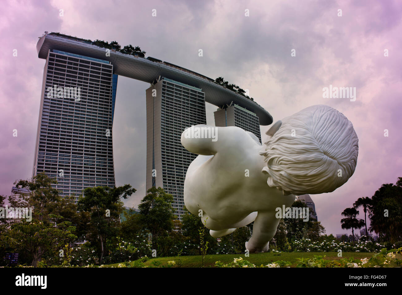 "Planet", a sculpture by Marc Quinn with Marina Bay Sands in background installed at Gardens By The Bay. Stock Photo
