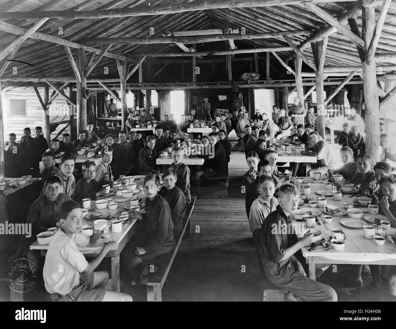 BOY SCOUT CAMP, c1919. /nBoy Scouts eating in the mess hall at Camp