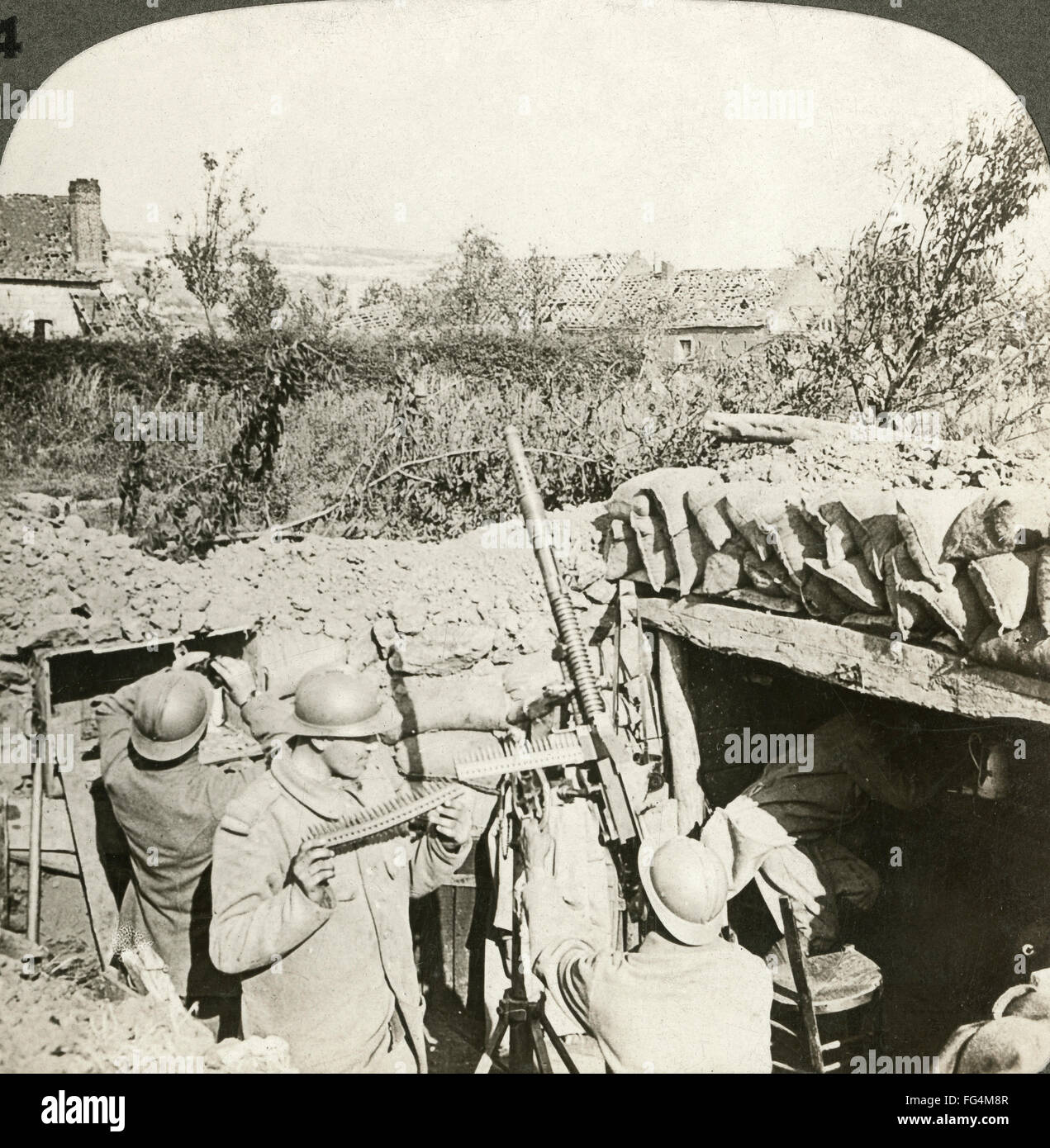 WORLD WAR I: ANTI-AIRCRAFT. /nFrench soldiers manning an anti-aircraft machine gun in a trench in rural France during World War I. Stereograph, c1914-1918. Stock Photo