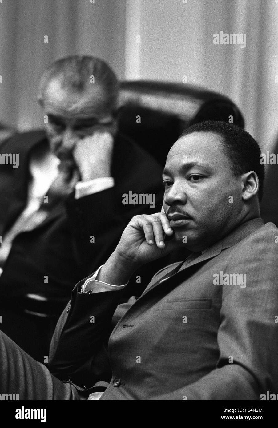 MARTIN LUTHER KING, JR. /n(1929-1968). American clergyman and civil rights leader. In a meeting with President Lyndon B. Johnson at the White House in Washington, D.C. Photograph by Yoichi Okamoto, 18 March 1966. Stock Photo