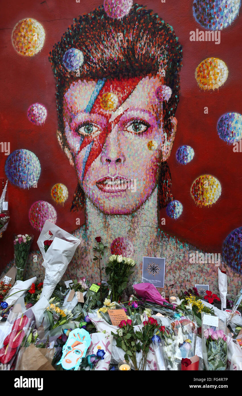 Flowers, candles and tributes commemorating the death of pop icon David ...