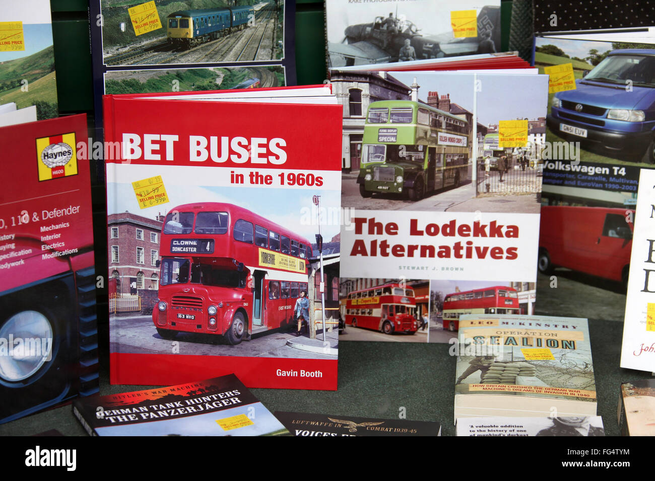Books about buses in a shop window Stock Photo