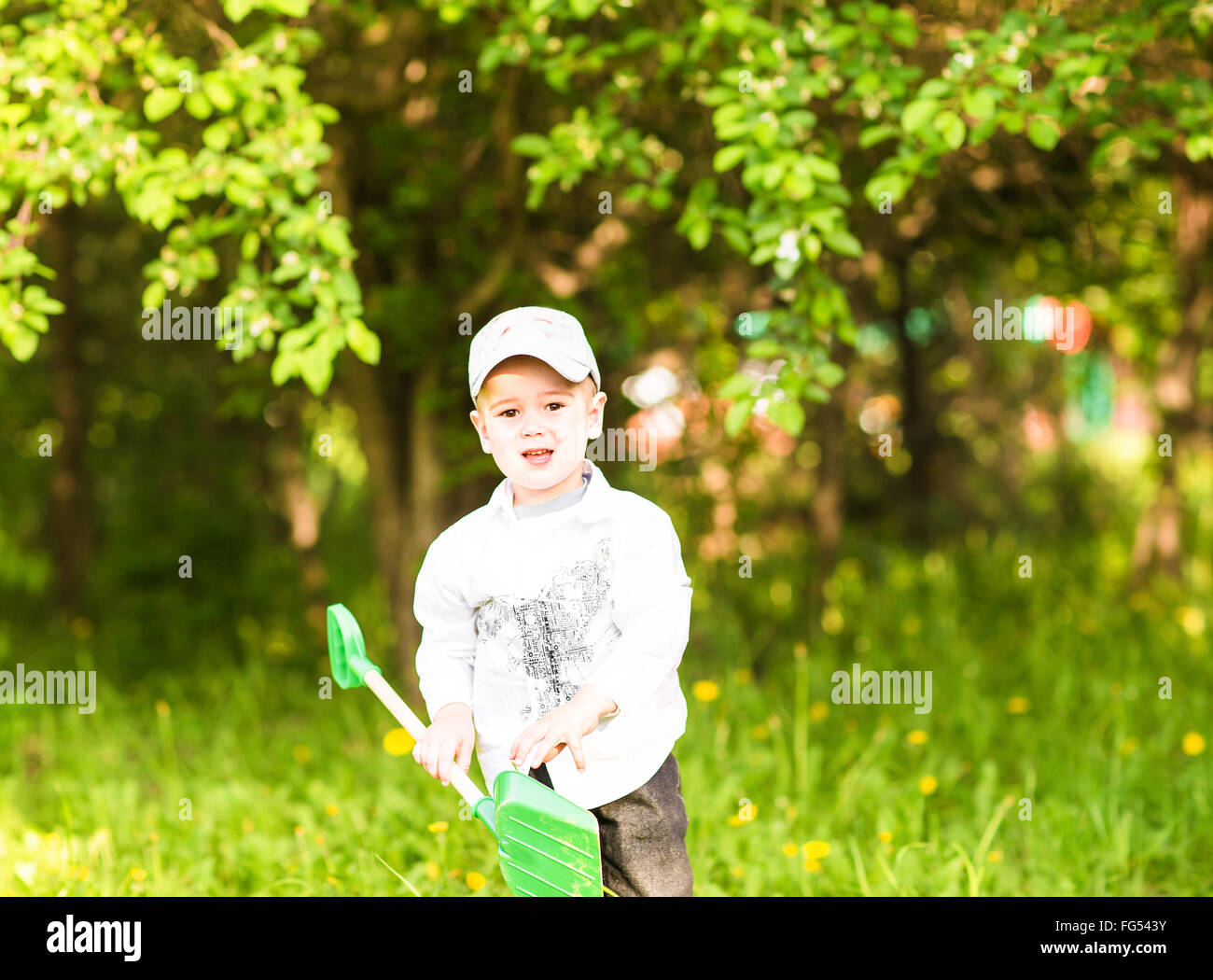 Portrait of a happy little boy in the park Stock Photo - Alamy