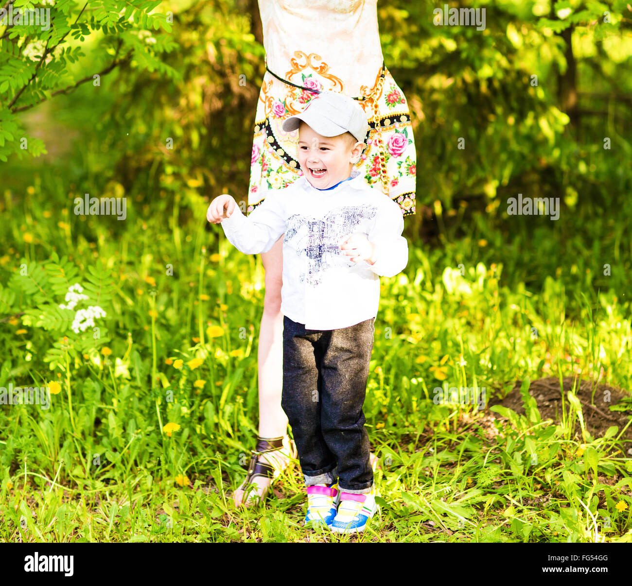 Portrait of a happy little boy in the park Stock Photo - Alamy