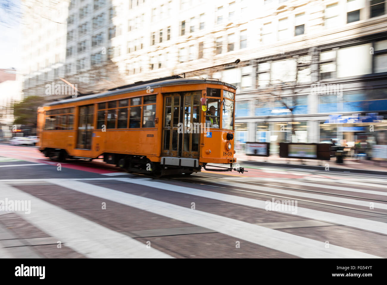 An icon of San Francisco, cable car / trolley, riding along the Market ...