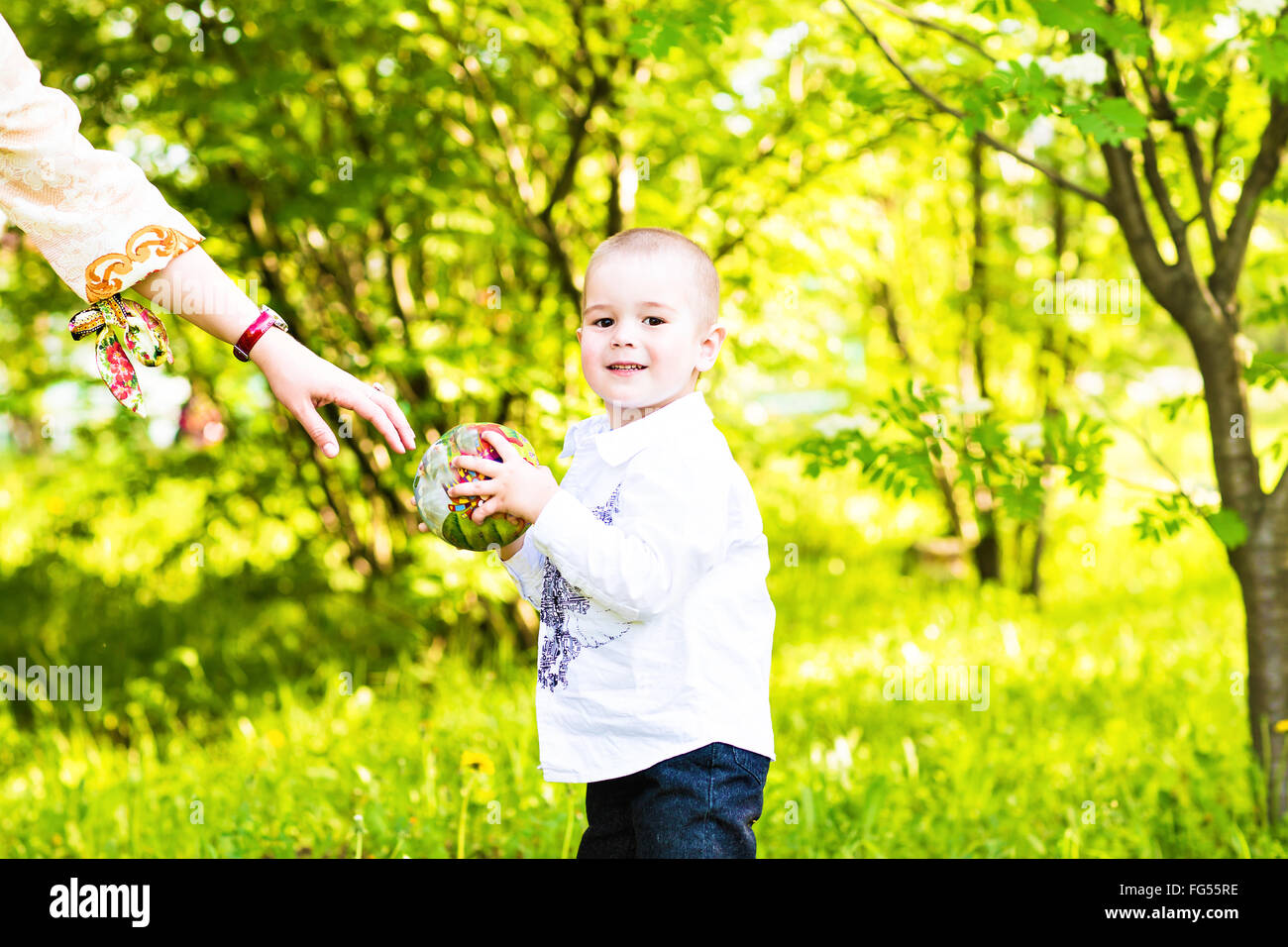 Portrait of a happy little boy in the park Stock Photo - Alamy