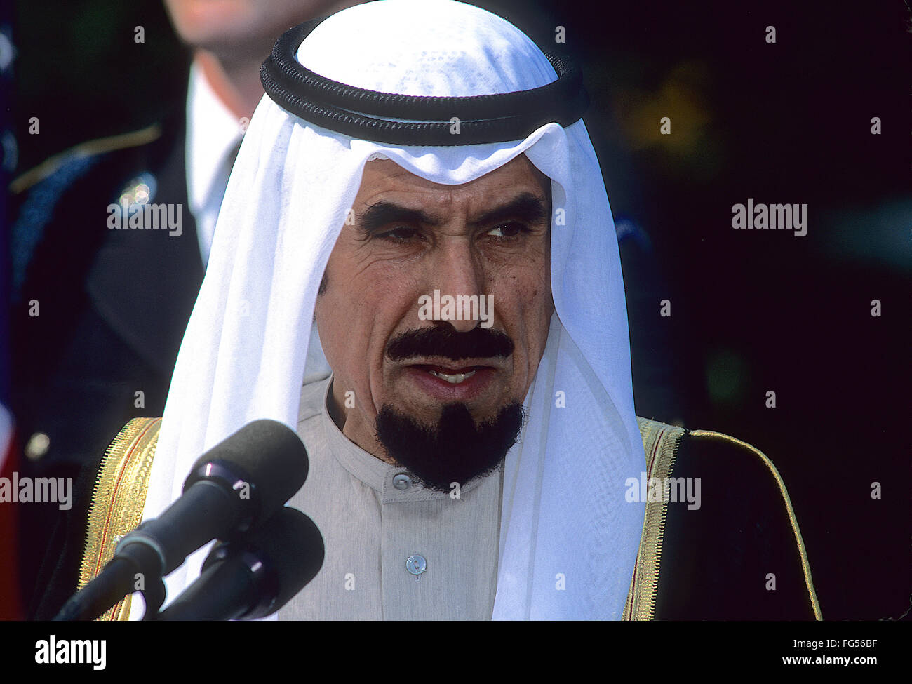 Washington, DC., USA, 28th September, 1990  The Emir of Kuwait Sheik Jaber III Al-Ahmad Al-Jaber Al-Sabah speaks to the press on the South Lawn of the White House during visit after the invasion of Kuwait by Iraq. The war is also known under other names, such as the Persian Gulf War, First Gulf War, Gulf War I, Kuwait War, or the First Iraq War, before the term 'Iraq War' became identified instead with the 2003 Iraq War (also referred to in the U.S. as 'Operation Iraqi Freedom'). Credit: Mark Reinstein Stock Photo