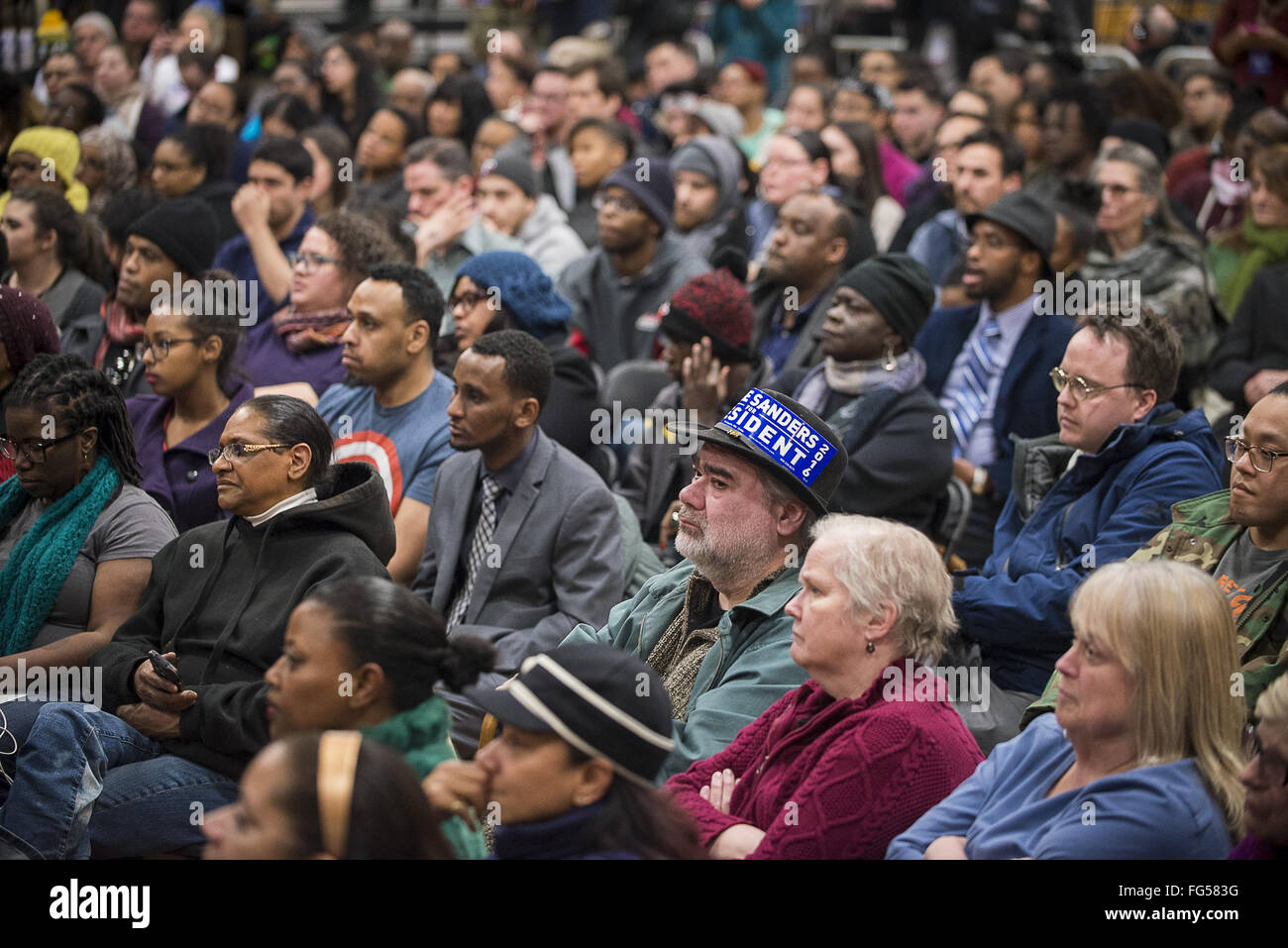 Minneapolis, Minnesota, USA. 13th Feb, 2016. A diverse audience of activists and potential voters listens to Bernie Sanders answer a question at the Black America Forum. Senator Bernie Sanders of Vermont, who is seeking the Democratic Party nomination for president, attended the Black America Forum, sponsored by MN Neighborhoods Organizing for Change at Patrick Henry High School in the largely African-American neighborhood of North Minneapolis, Minnesota on Friday, February 12, 2016. After beating Hillary Clinton in the New Hampshire primary earlier in the week, Sen. Sanders began c Stock Photo