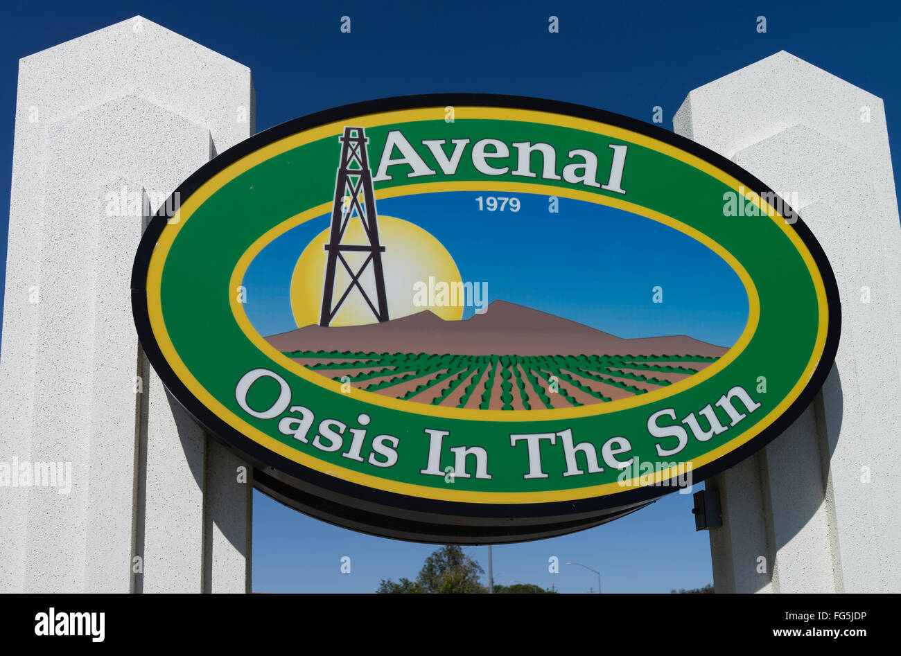 A colorful welcome sign for Avenal, California is posted at the city limits advertising the entrance to the town. Stock Photo