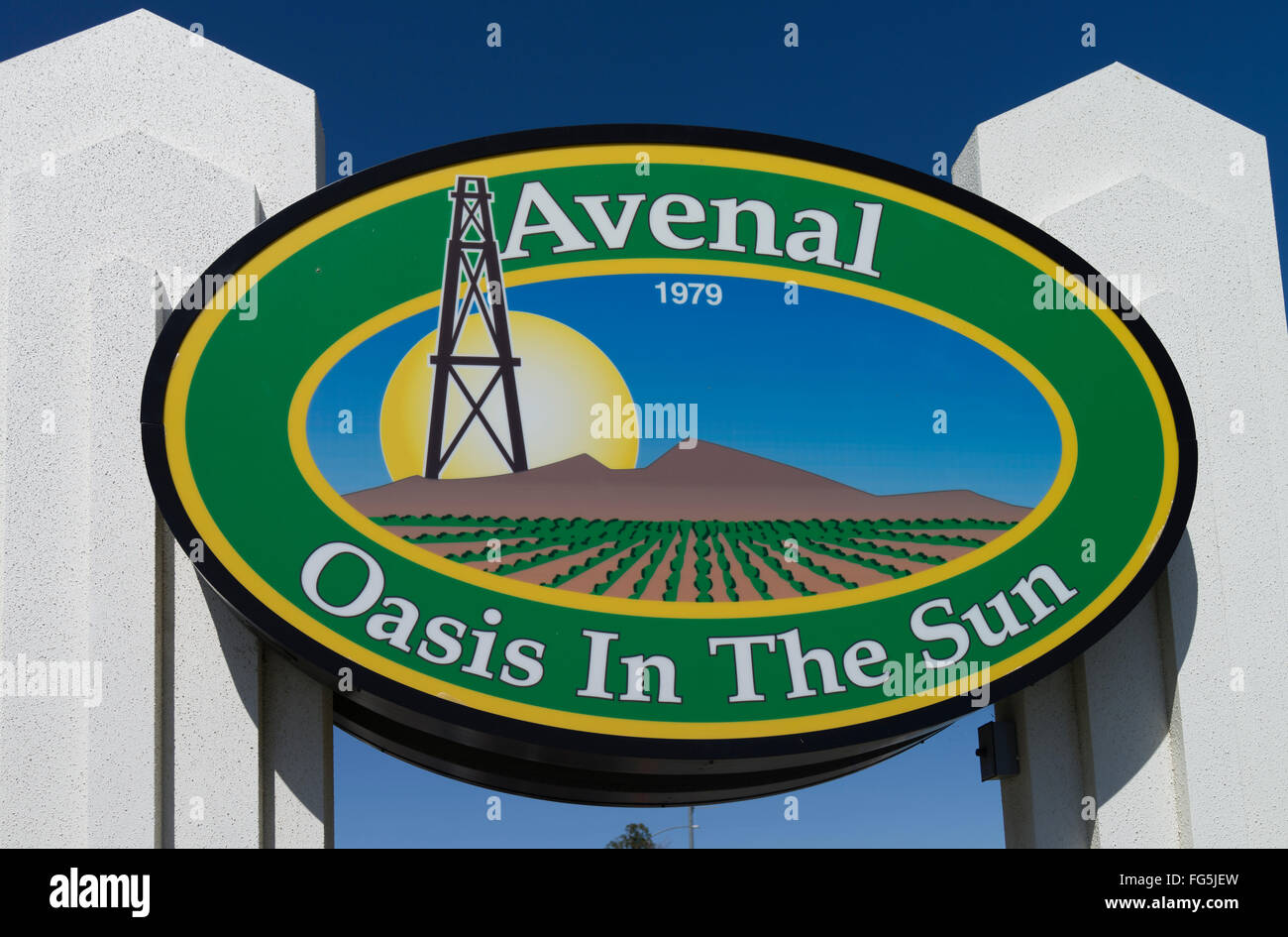 A colorful welcome sign for Avenal, California is posted at the city limits advertising the entrance to the town. Stock Photo